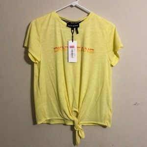 Yellow short sleeve shirt. Received as a gift. It is too small for me.